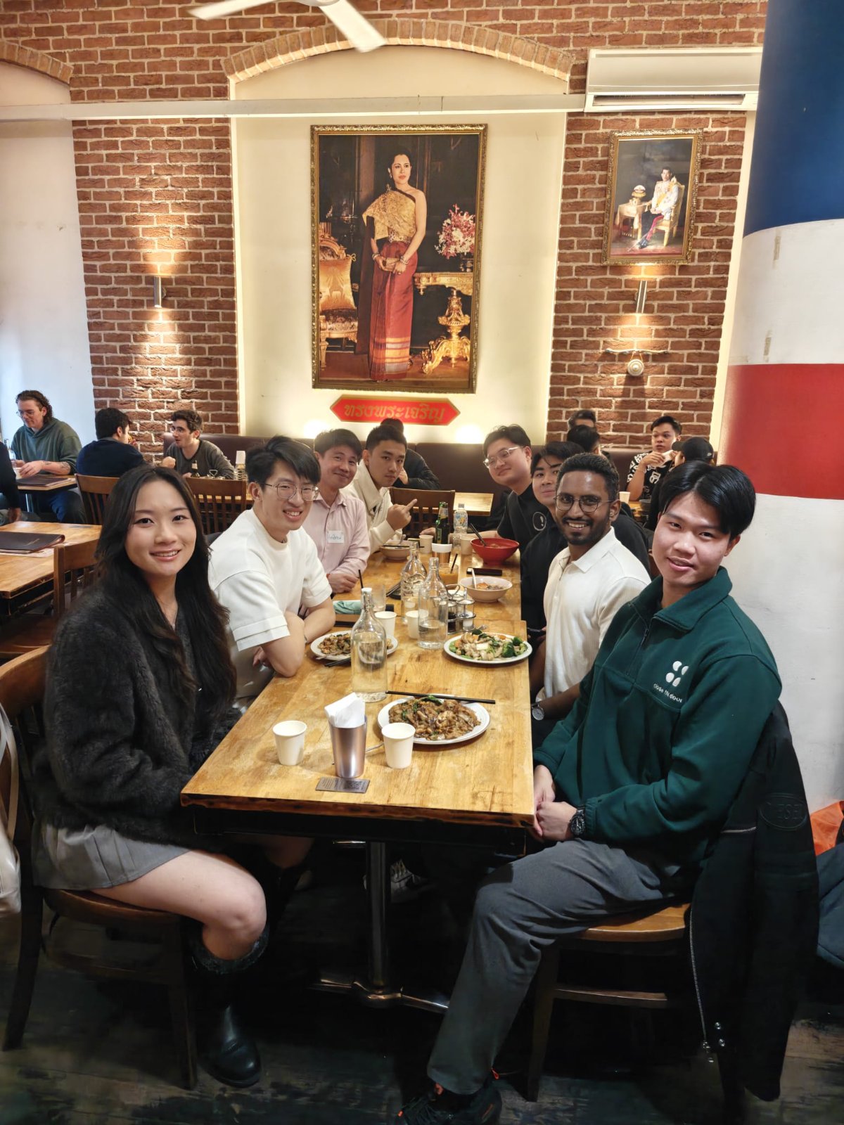 Friends queuing outside a restaurant worth the wait